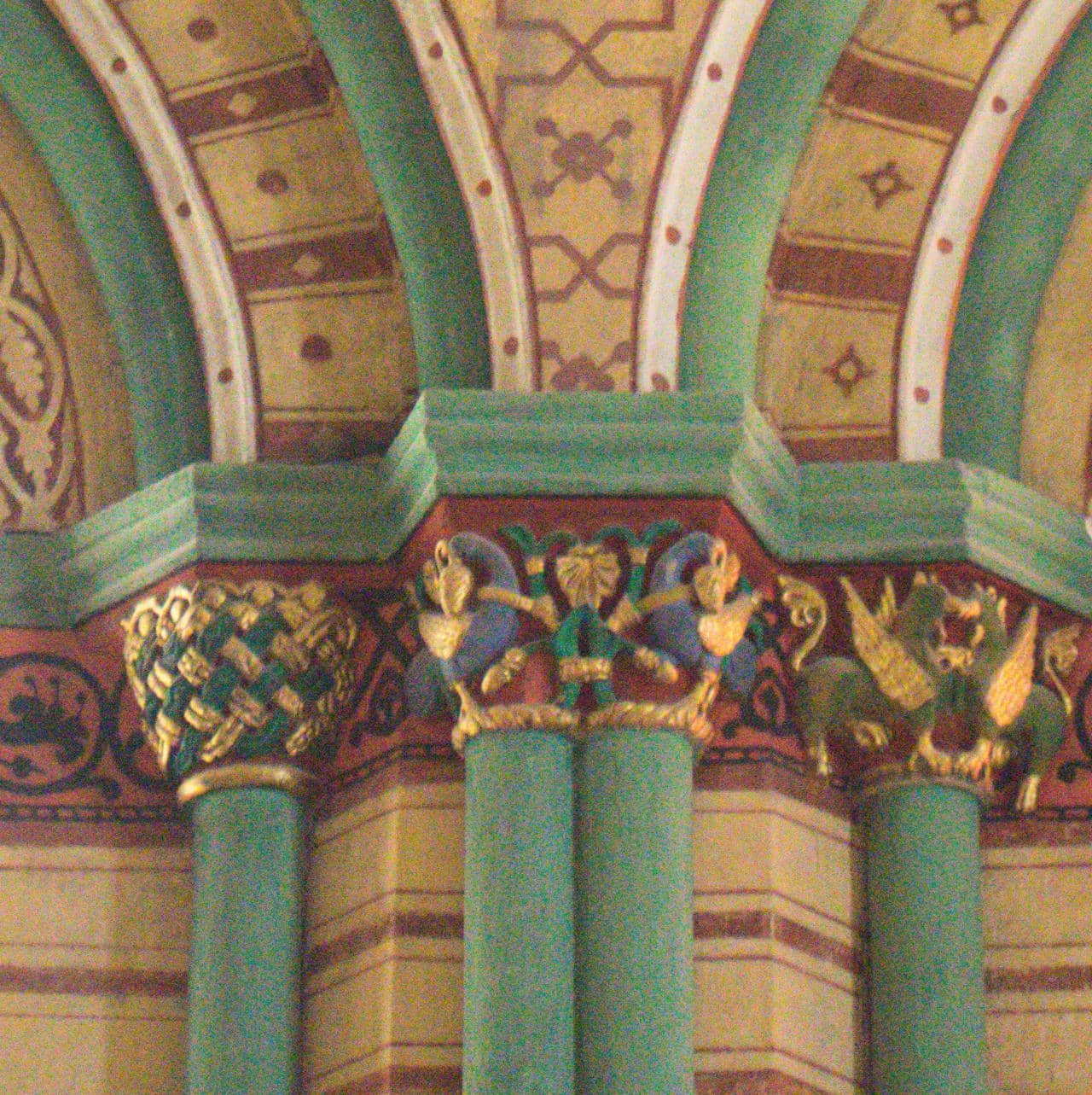 The interior is fully painted and features very detailed carved capitals